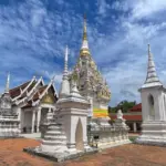 Pagoda and Buddha images at Wat Phra Borommathat Chaiya in Surat Thani