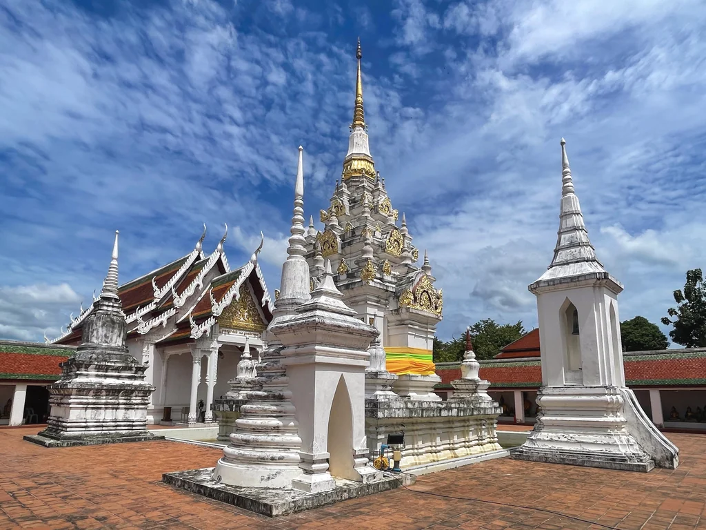 Pagoda and Buddha images at Wat Phra Borommathat Chaiya in Surat Thani