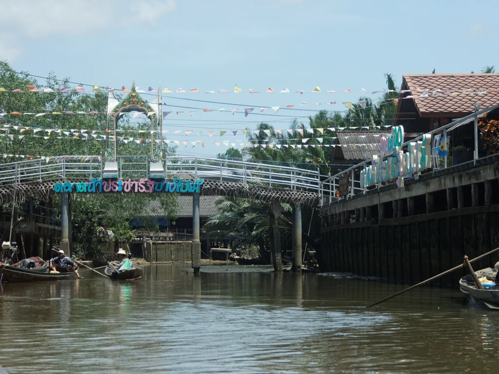 Boats on a canal at Bang Bai Mai floating market in Surat Thani